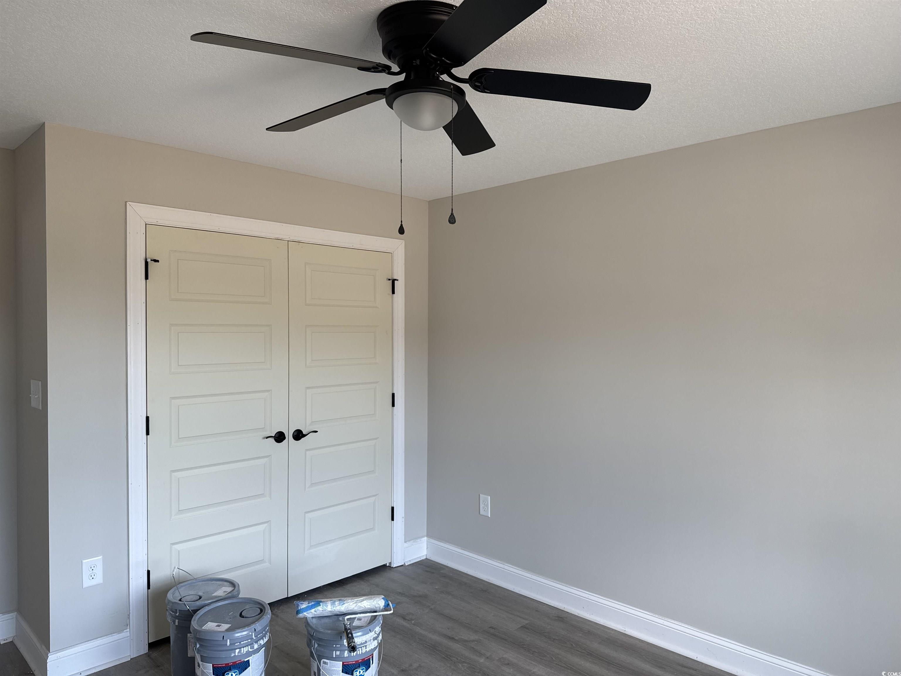 4020 Copperhead Road Conway, SC 29527 - Photo 10 of 16 Unfurnished bedroom with a closet, dark wood-style