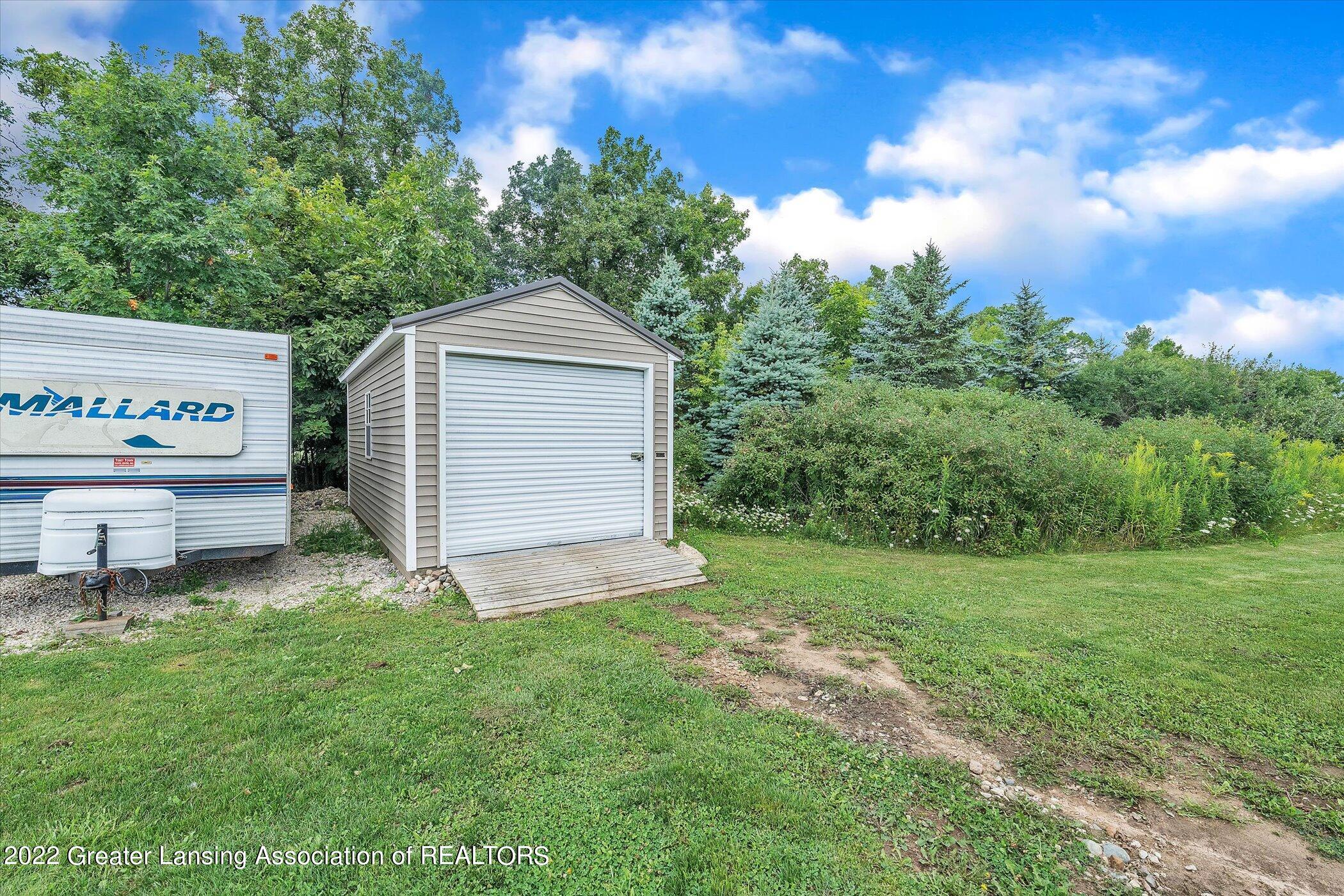 1590 East Jason Road St. Johns, MI 48879 - Photo 51 of 75 51-1590-E-Jason-Rd-WindowStill-Real-Esta