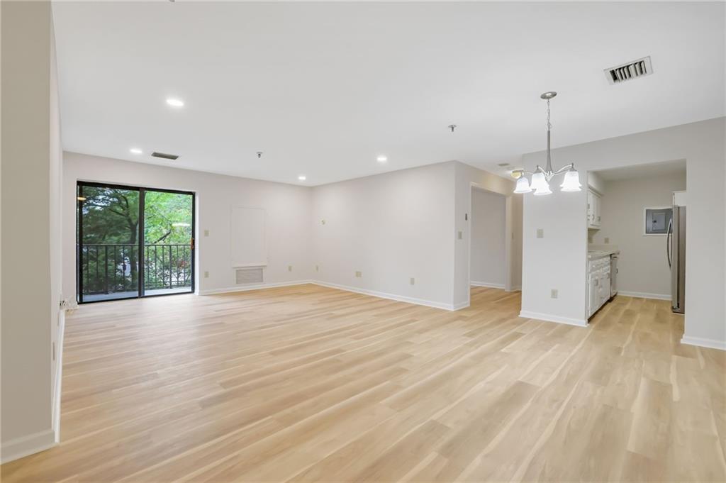 300 Johnson Ferry Road, Unit B103 Atlanta, GA 30328 - Photo 13 of 40 a view of an empty room with a window