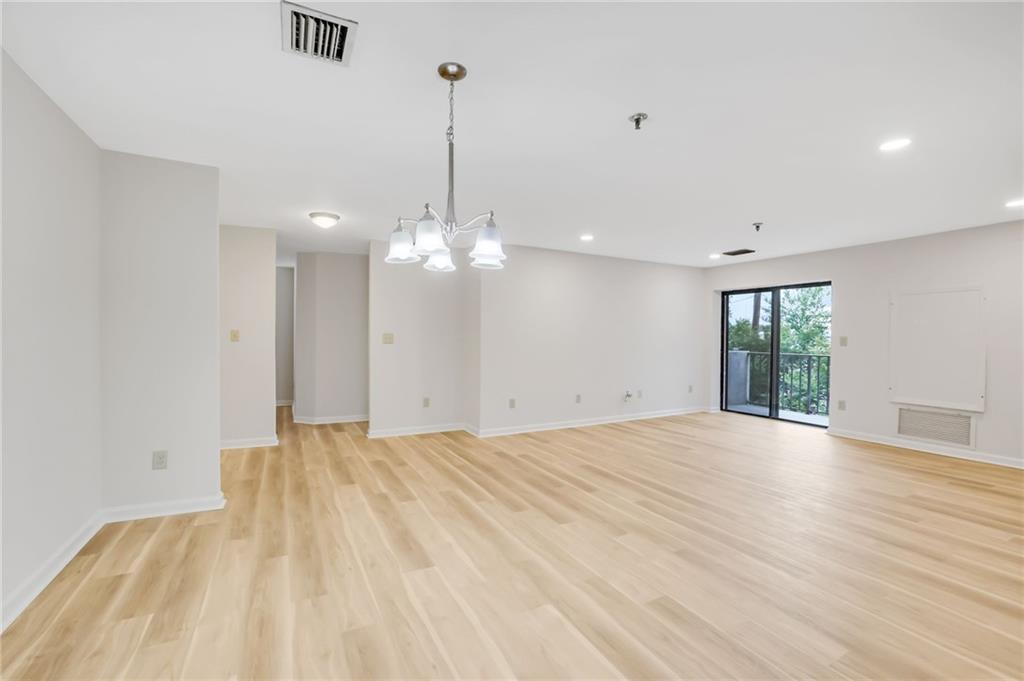 300 Johnson Ferry Road, Unit B103 Atlanta, GA 30328 - Photo 15 of 40 a view of an empty room with a window