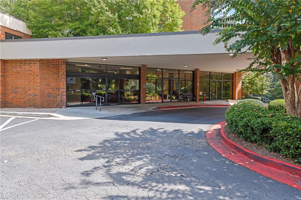 300 Johnson Ferry Road, Unit B103 Atlanta, GA 30328 - Photo 2 of 40 a view of a chairs in front of a building