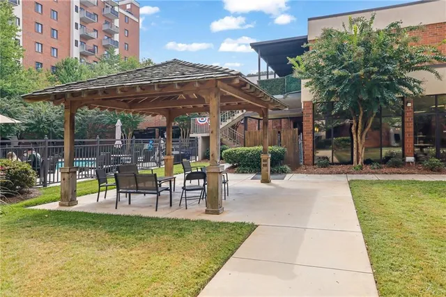a view of a swimming pool with a patio