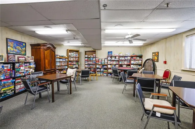 a living room with lots of furniture and a flat screen tv