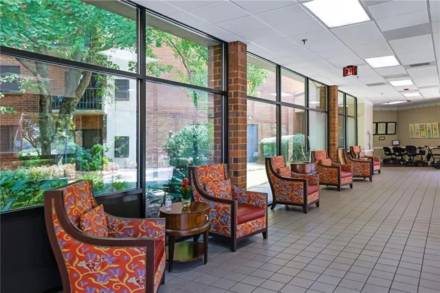 a outdoor space with patio the couches and a dining table with garden view