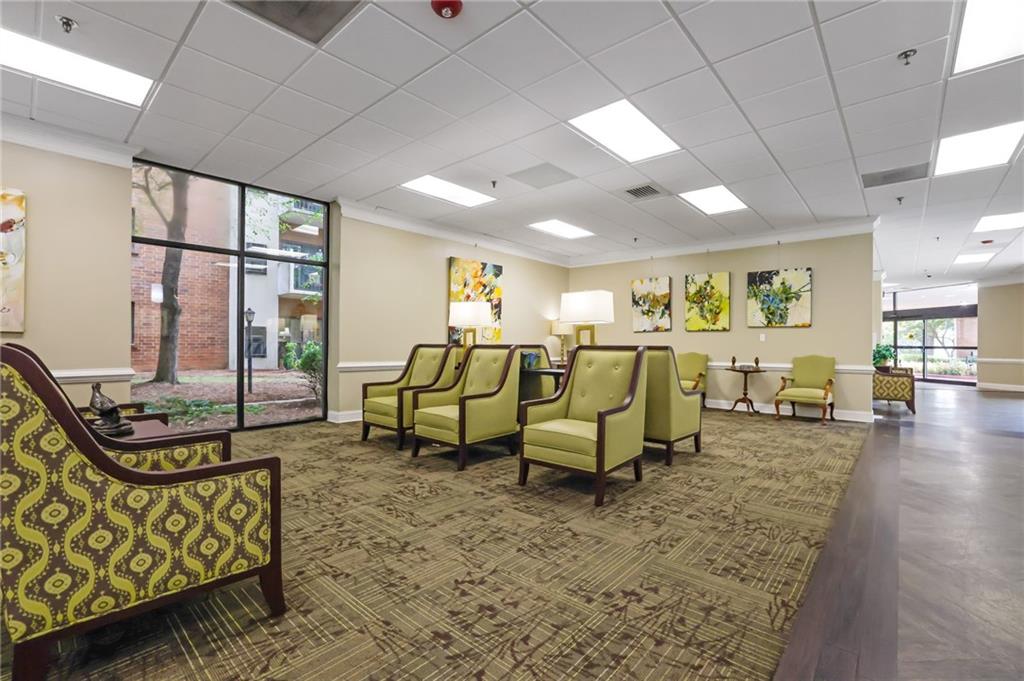 300 Johnson Ferry Road, Unit B103 Atlanta, GA 30328 - Photo 36 of 40 a living room with furniture