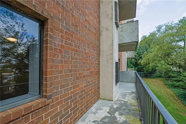 a view of a pathway both side of house