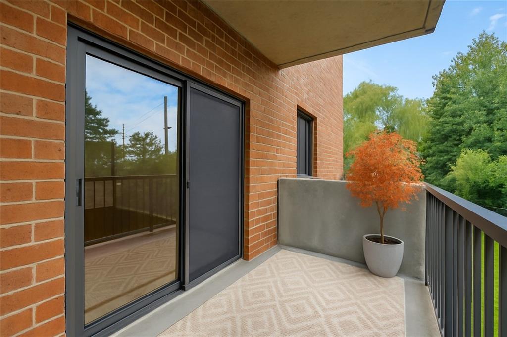 300 Johnson Ferry Road, Unit B103 Atlanta, GA 30328 - Photo 7 of 40 a view of a door and outdoor space