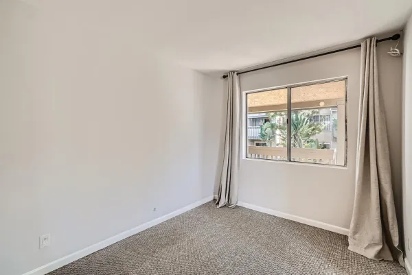 an empty room with window