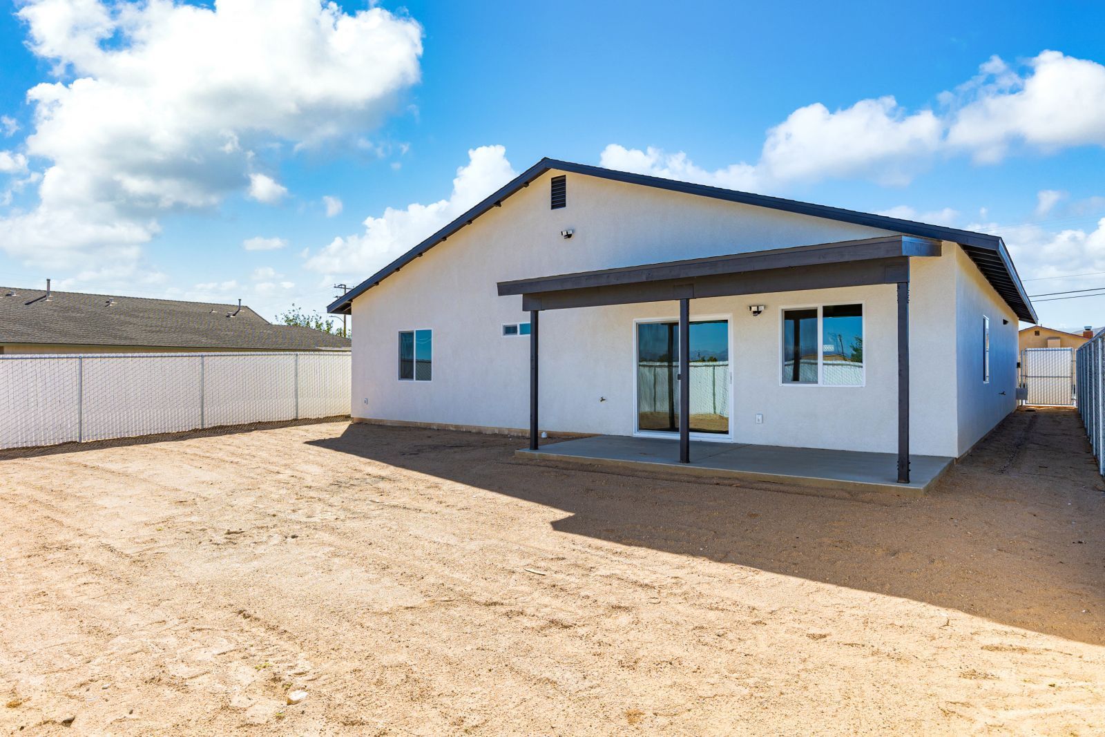 1112 Vulcan Ridgecrest, CA 93555 - Photo 28 of 30 a front view of a house with a garage