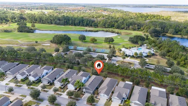 an aerial view of a houses with outdoor space and garden view