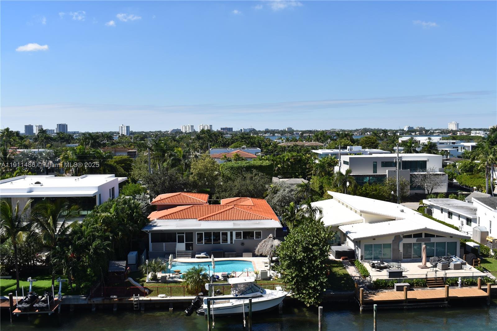 9940 West Bay Harbor Drive, Unit 6DN Bay Harbor Islands, FL 33154 - Photo 19 of 46 a view of multiple houses with a city street