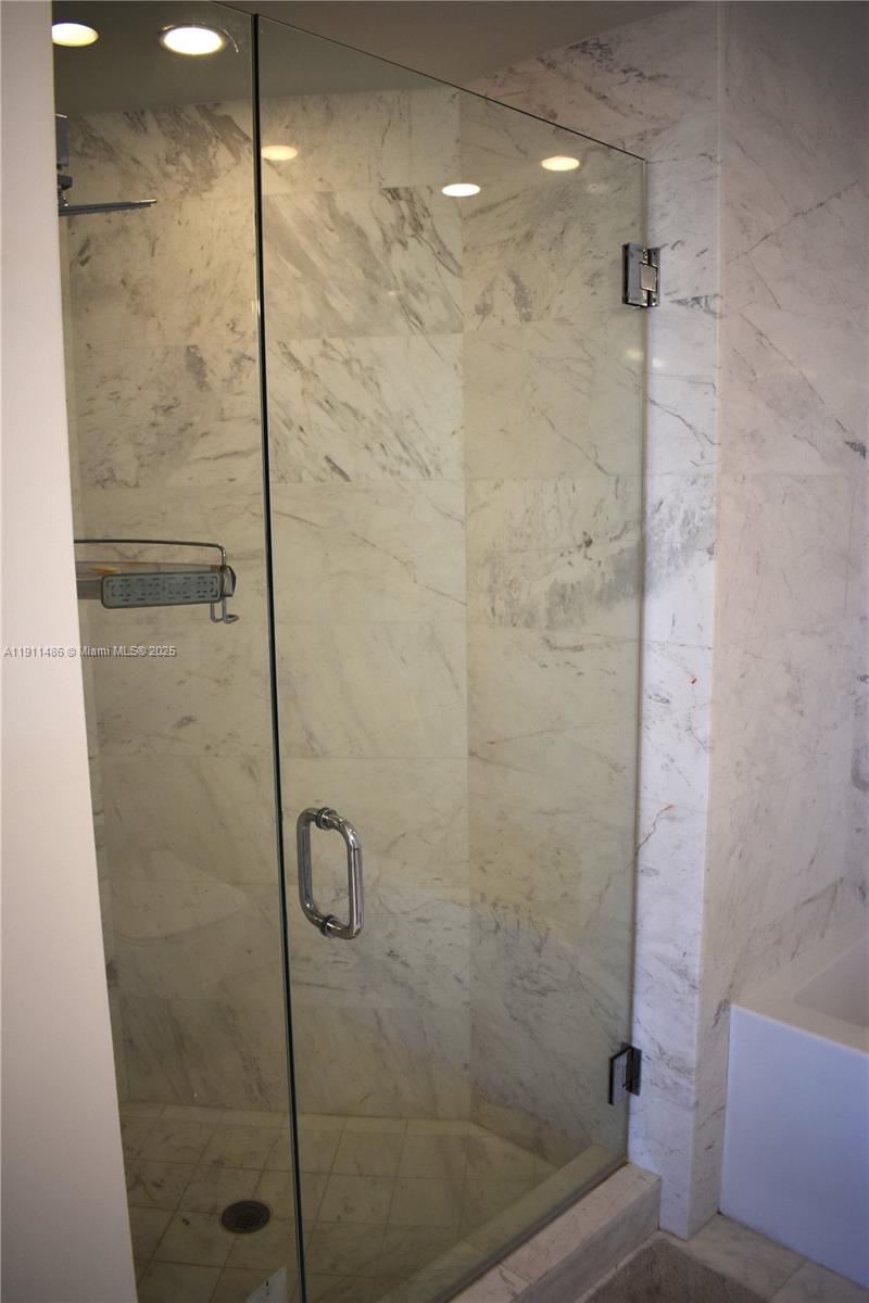 9940 West Bay Harbor Drive, Unit 6DN Bay Harbor Islands, FL 33154 - Photo 27 of 46 a bathroom with a shower