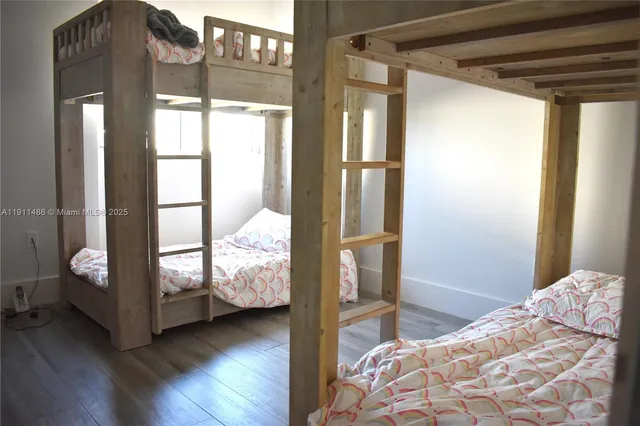 a bathroom with a shower and toilet