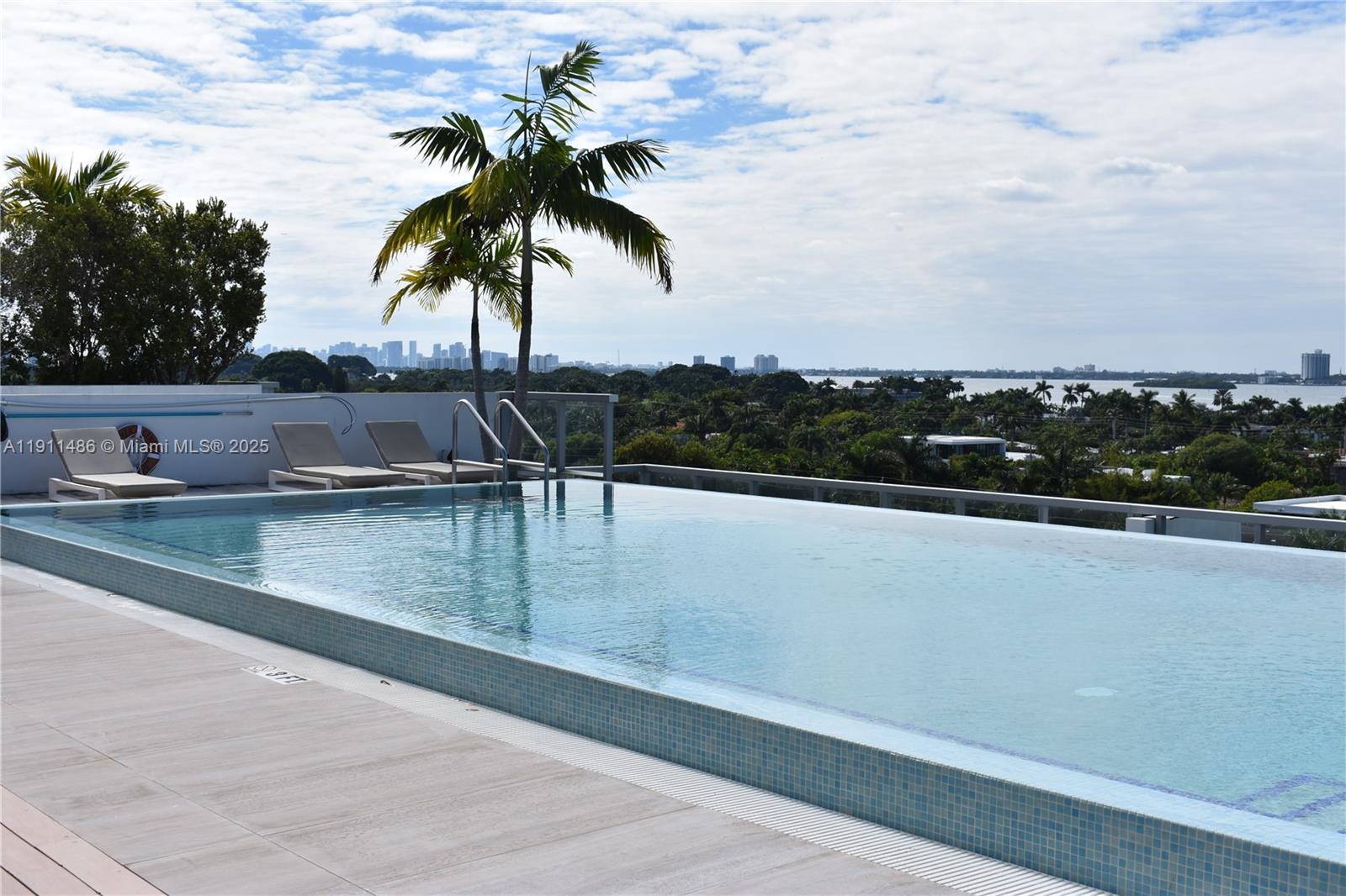 9940 West Bay Harbor Drive, Unit 6DN Bay Harbor Islands, FL 33154 - Photo 33 of 46 a view of outdoor space and yard