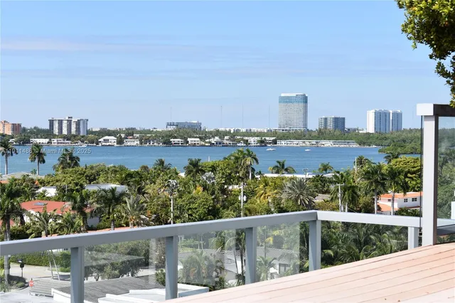 a view of a balcony with city view