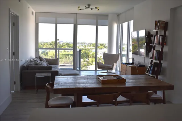 a view of a workspace with furniture