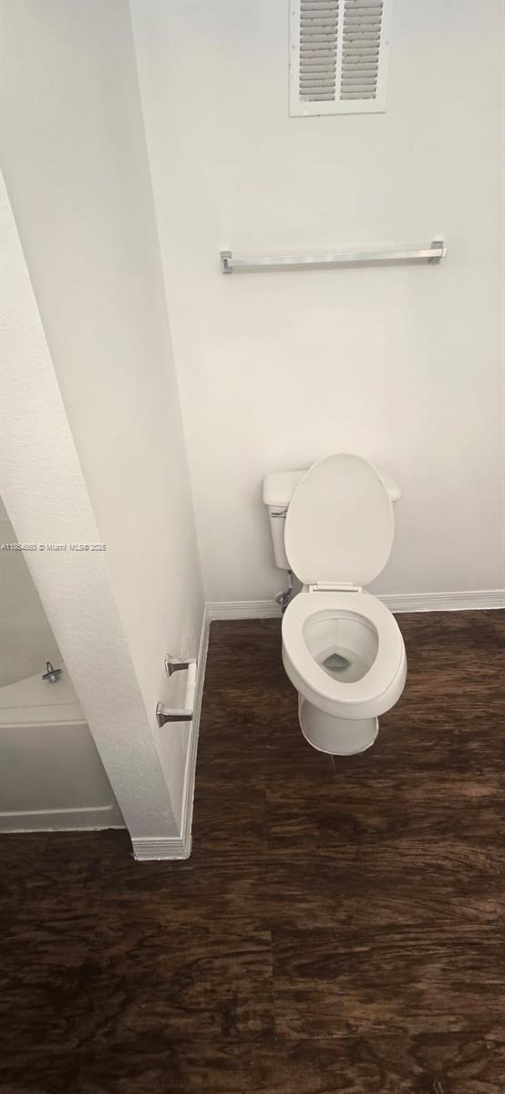 11630 Southwest 2nd Street, Unit 17208 Pembroke Pines, FL 33025 - Photo 19 of 32 a bathroom with a toilet and a sink