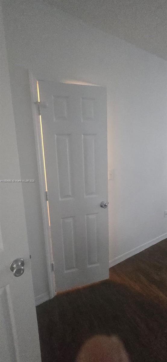 11630 Southwest 2nd Street, Unit 17208 Pembroke Pines, FL 33025 - Photo 31 of 32 a view of room with wooden floor