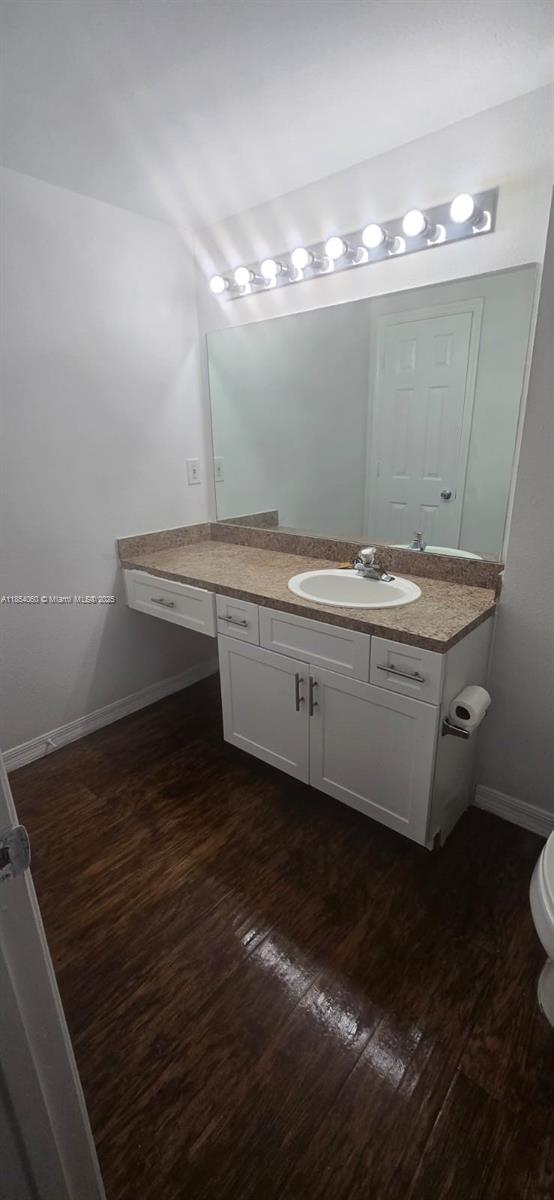 11630 Southwest 2nd Street, Unit 17208 Pembroke Pines, FL 33025 - Photo 4 of 32 a bathroom with a sink and a mirror
