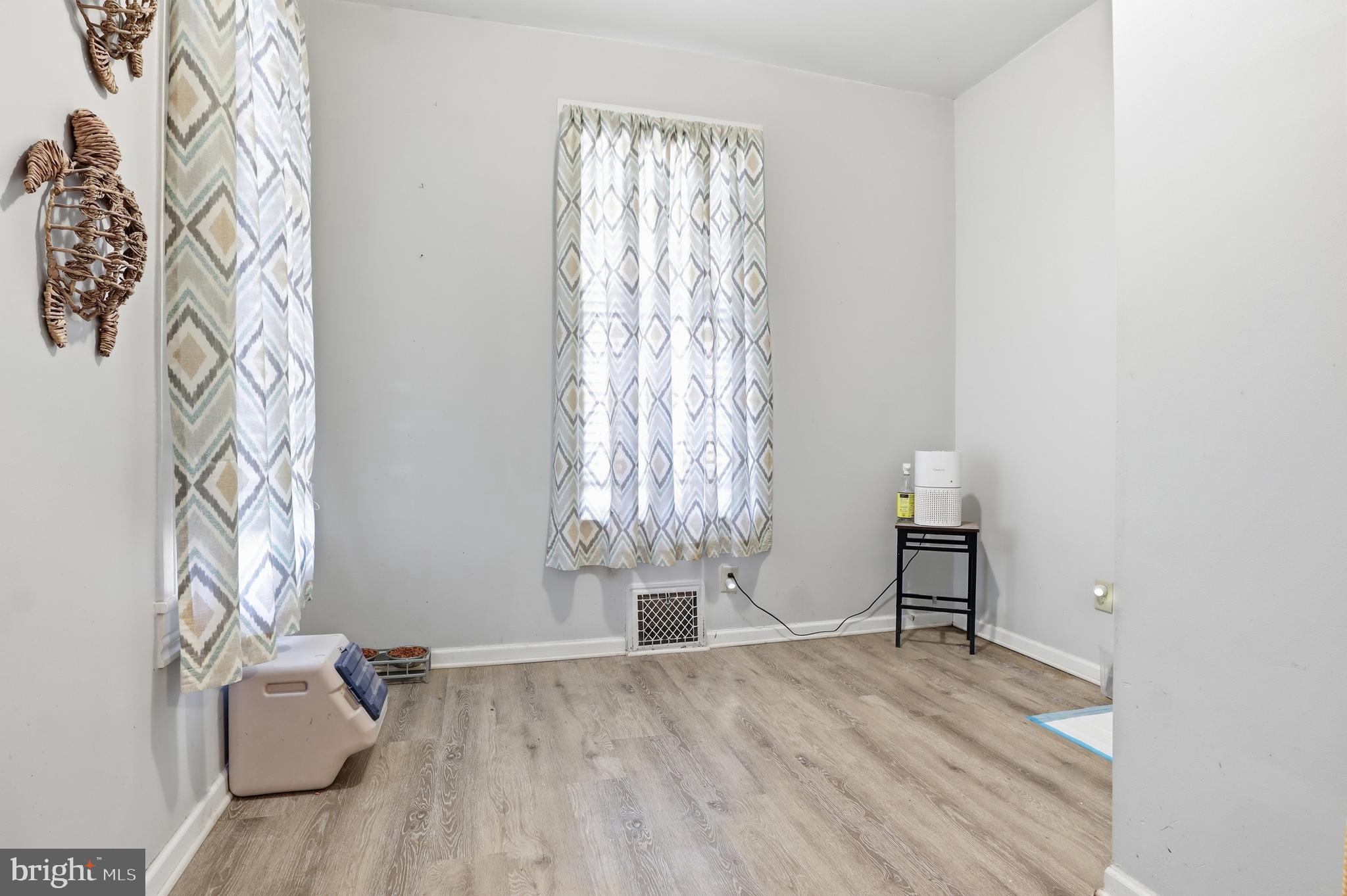 70 North Main Street Dover, PA 17315 - Photo 11 of 43 a view of a room with window and wooden floor