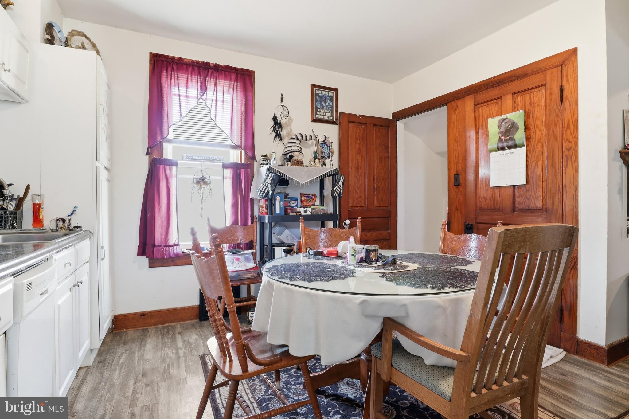 70 North Main Street Dover, PA 17315 - Photo 23 of 43 a view of a dining room with furniture and window