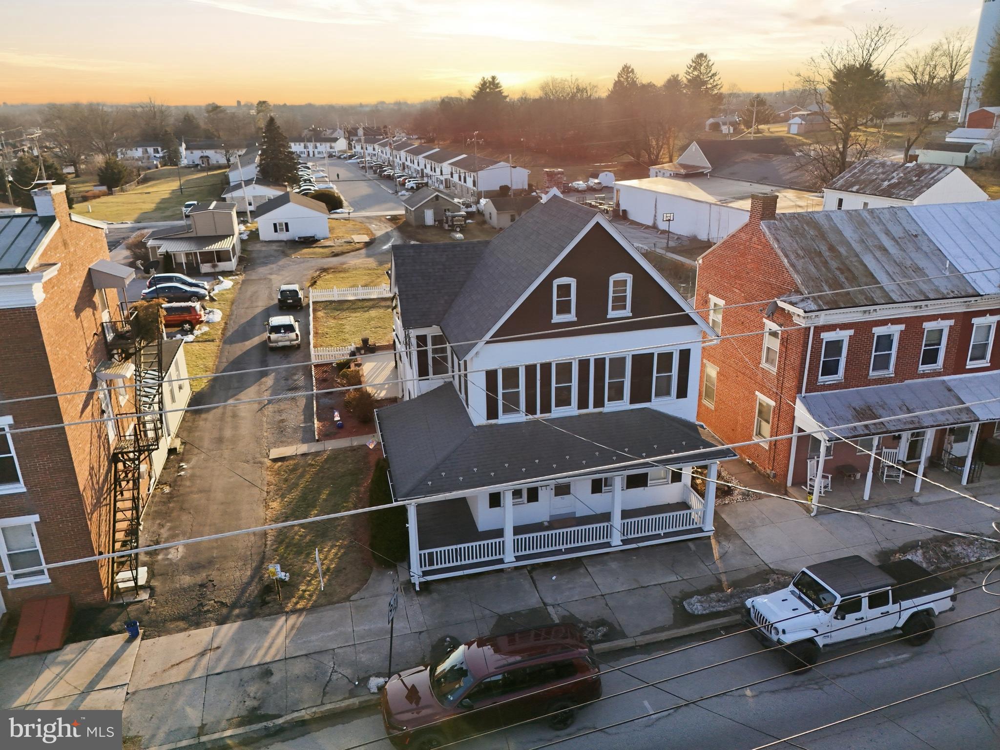 70 North Main Street Dover, PA 17315 - Photo 42 of 43 an aerial view of residential houses with outdoor space
