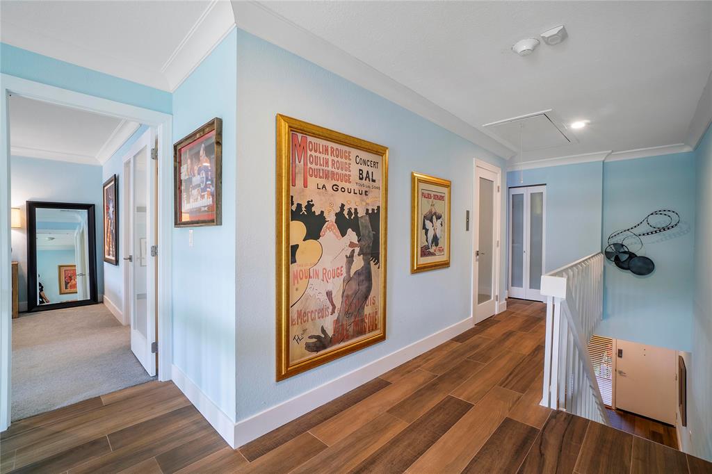 3908 South Ocean Boulevard, Unit TH4 Boca Raton, FL 33487 - Photo 15 of 37 a view of a hallway with wooden floor and furniture