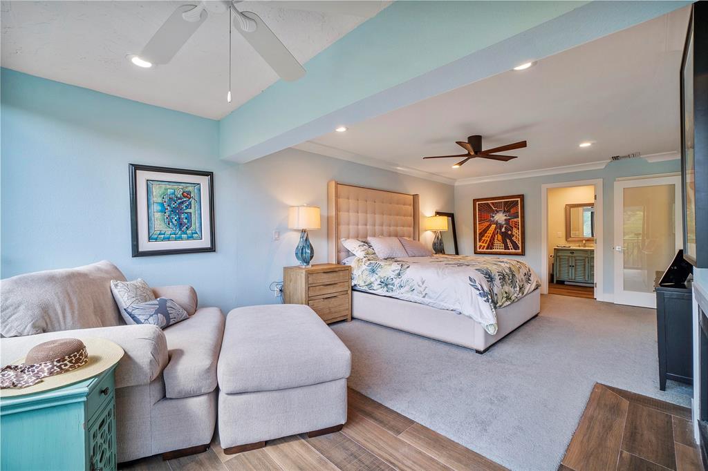 3908 South Ocean Boulevard, Unit TH4 Boca Raton, FL 33487 - Photo 17 of 37 a bedroom with a large bed and a couch