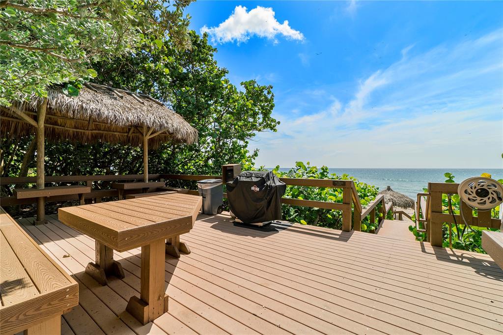 3908 South Ocean Boulevard, Unit TH4 Boca Raton, FL 33487 - Photo 30 of 37 a view of a terrace with sitting area