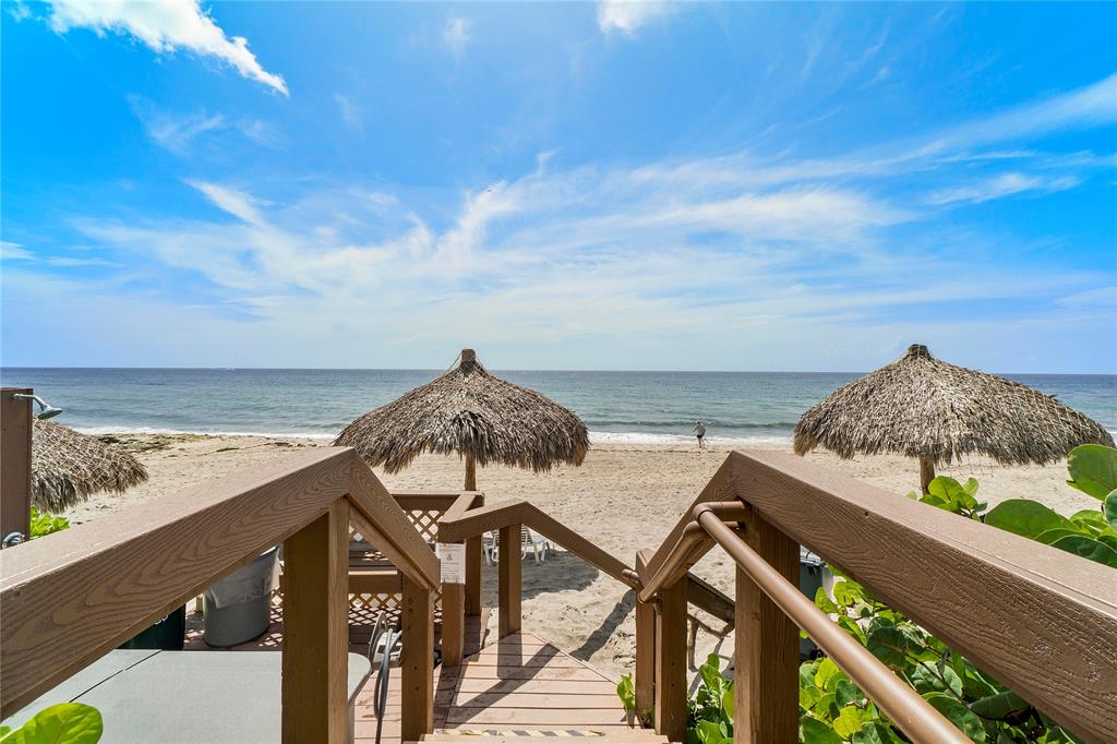 3908 South Ocean Boulevard, Unit TH4 Boca Raton, FL 33487 - Photo 31 of 37 a view of a balcony with an outdoor seating