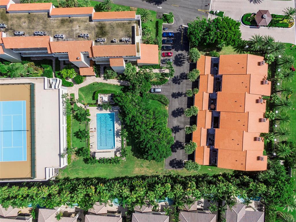 3908 South Ocean Boulevard, Unit TH4 Boca Raton, FL 33487 - Photo 33 of 37 an aerial view of multiple houses with yard
