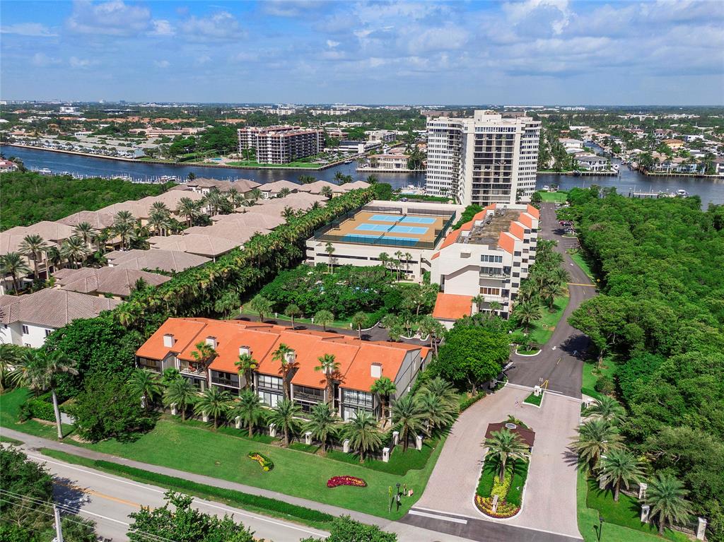 3908 South Ocean Boulevard, Unit TH4 Boca Raton, FL 33487 - Photo 36 of 37 an aerial view of residential building and lake view