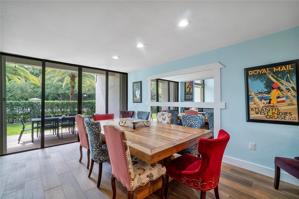 3908 South Ocean Boulevard, Unit TH4 Boca Raton, FL 33487 - Photo 8 of 37 a view of a dining room with furniture window and outside view