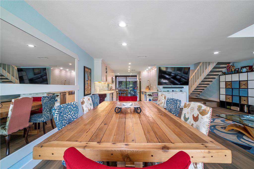 3908 South Ocean Boulevard, Unit TH4 Boca Raton, FL 33487 - Photo 9 of 37 a living room with furniture and a flat screen tv