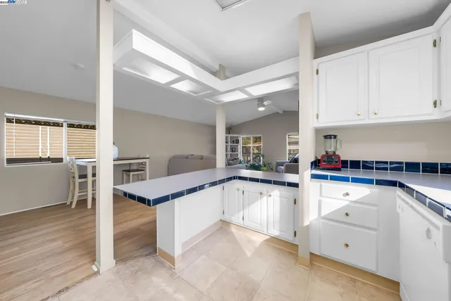 a room with a bed and a window