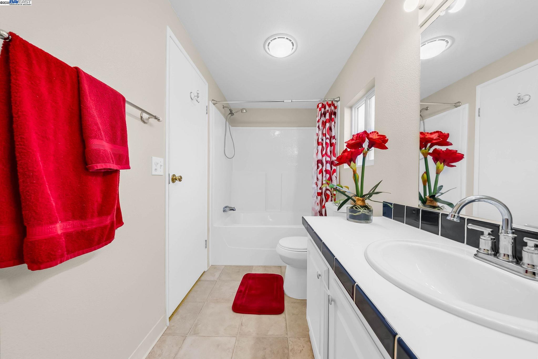 711 Old Canyon Road, Unit 176 Fremont, CA 94536 - Photo 23 of 41 a bathroom with a sink vanity mirror and tub