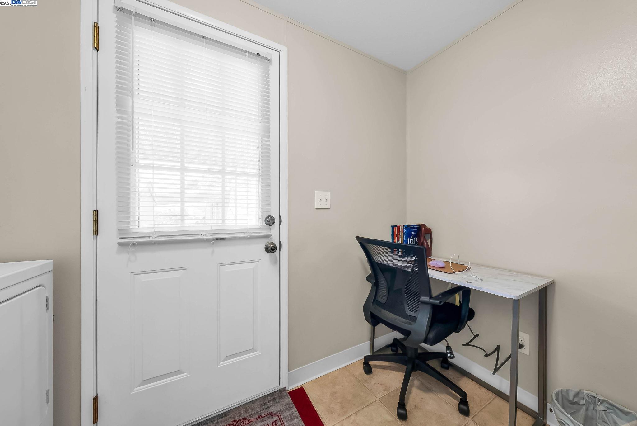 711 Old Canyon Road, Unit 176 Fremont, CA 94536 - Photo 30 of 41 a view of a workspace with furniture and a window