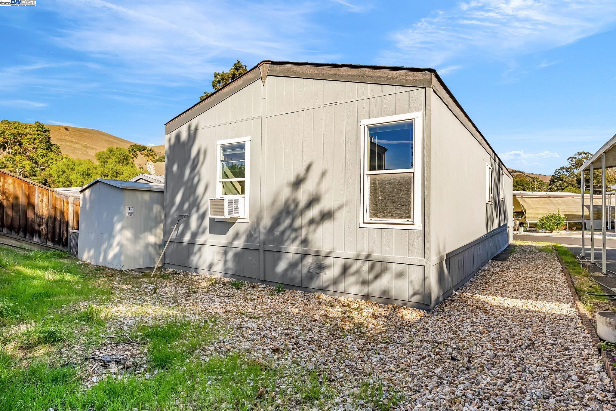 711 Old Canyon Road, Unit 176 Fremont, CA 94536 - Photo 31 of 41 a view of a house with backyard