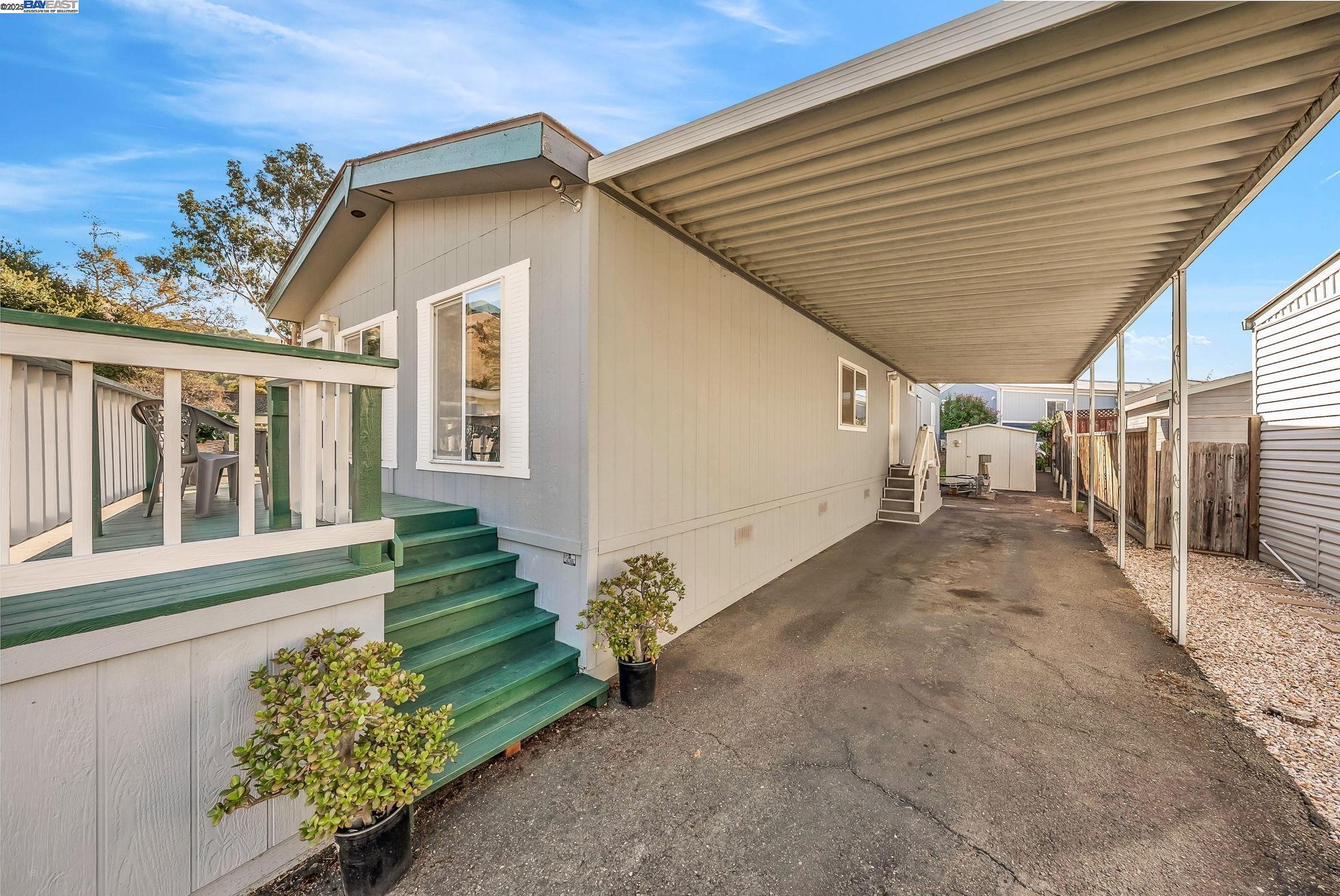 711 Old Canyon Road, Unit 176 Fremont, CA 94536 - Photo 35 of 41 a view of a house with a backyard