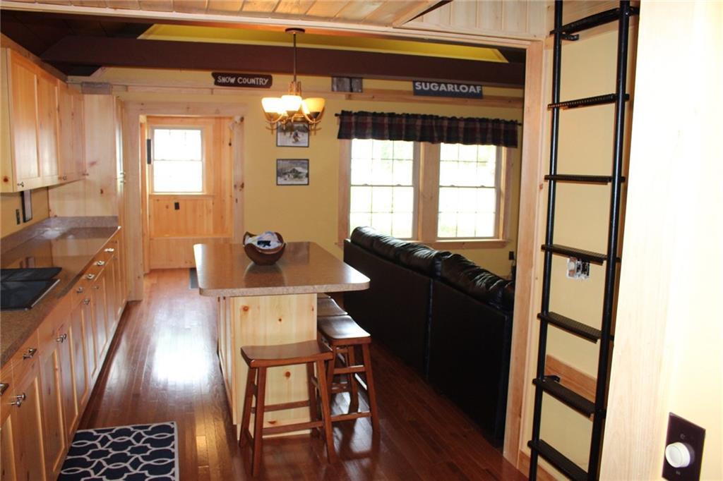 11 Willie Road Stratton, ME 04982 - Photo 10 of 23 View of the kitchen, living room...