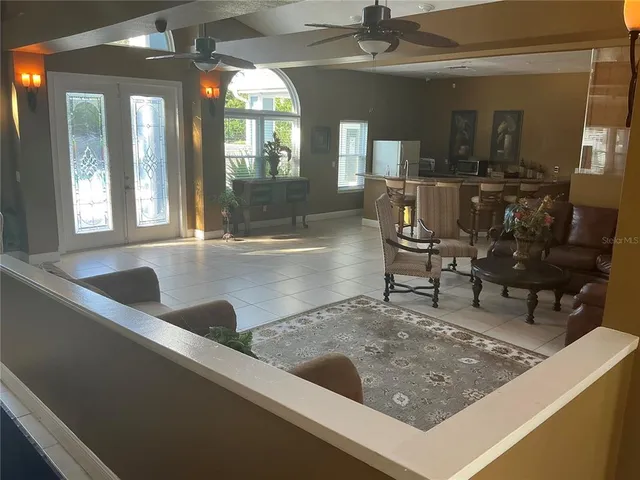 a view of a swimming pool with a patio