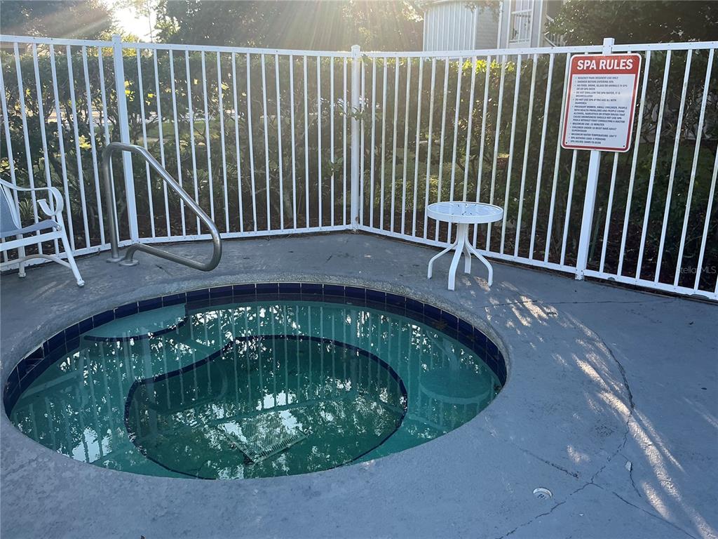 715 Sugar Bay Way, Unit 107 Lake Mary, FL 32746 - Photo 25 of 48 a view of a swimming pool with a patio