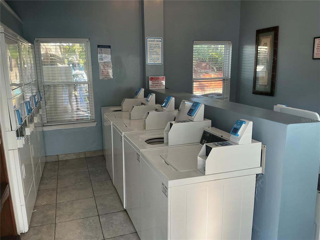 715 Sugar Bay Way, Unit 107 Lake Mary, FL 32746 - Photo 27 of 48 a utility room with dryer and washer