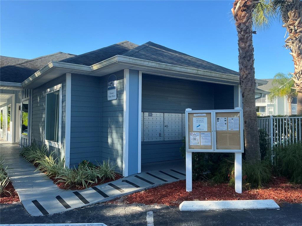 715 Sugar Bay Way, Unit 107 Lake Mary, FL 32746 - Photo 33 of 48 a front view of a house with garden