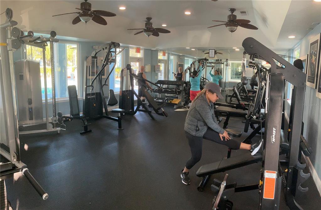 715 Sugar Bay Way, Unit 107 Lake Mary, FL 32746 - Photo 34 of 48 a view of a room with gym equipment