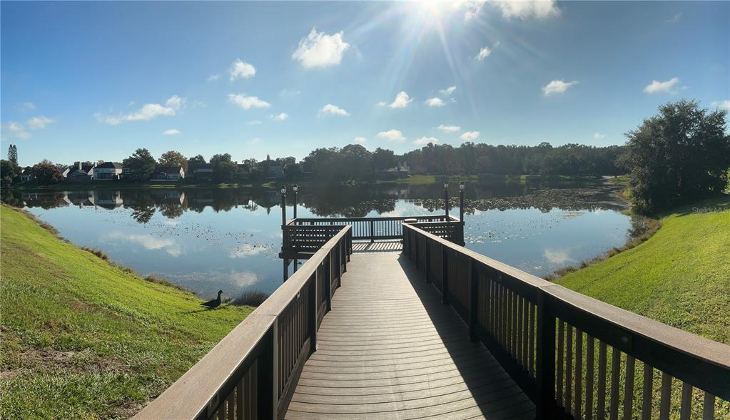 715 Sugar Bay Way, Unit 107 Lake Mary, FL 32746 - Photo 39 of 48 a view of a lake and outdoor space