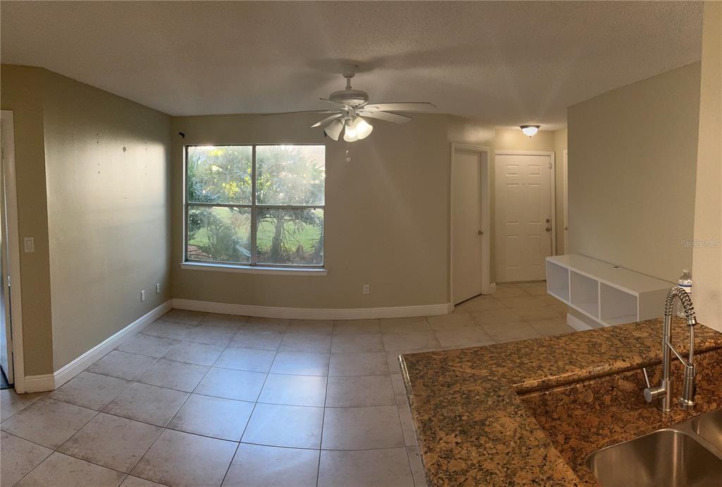 715 Sugar Bay Way, Unit 107 Lake Mary, FL 32746 - Photo 6 of 48 a view of livingroom with furniture