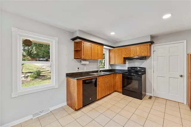 $385,000 | 6319 Sherwood Lane, Merriam, KS 66203