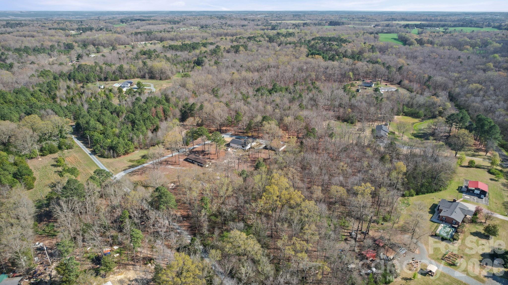 5808 Flint Ridge Marshville, NC 28103 - Photo 38 of 38 an aerial view of house with yard and mountain view