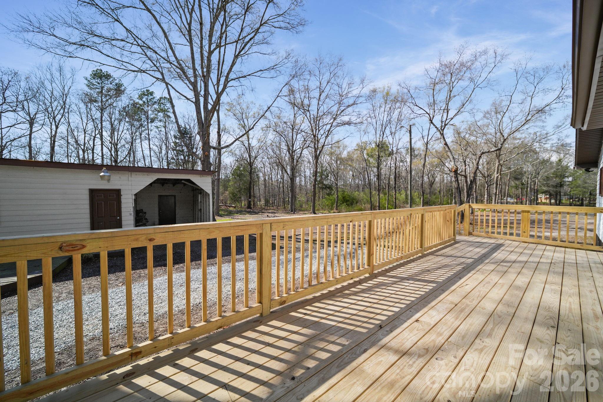 5808 Flint Ridge Marshville, NC 28103 - Photo 6 of 38 a view of a wooden balcony